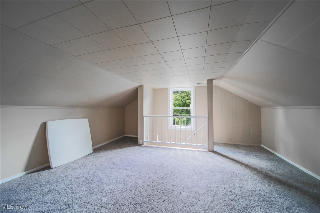 3181 Dover Road Wooster, OH 44691 - Photo 16 of 25 Bonus room with carpet flooring and lofted ceiling