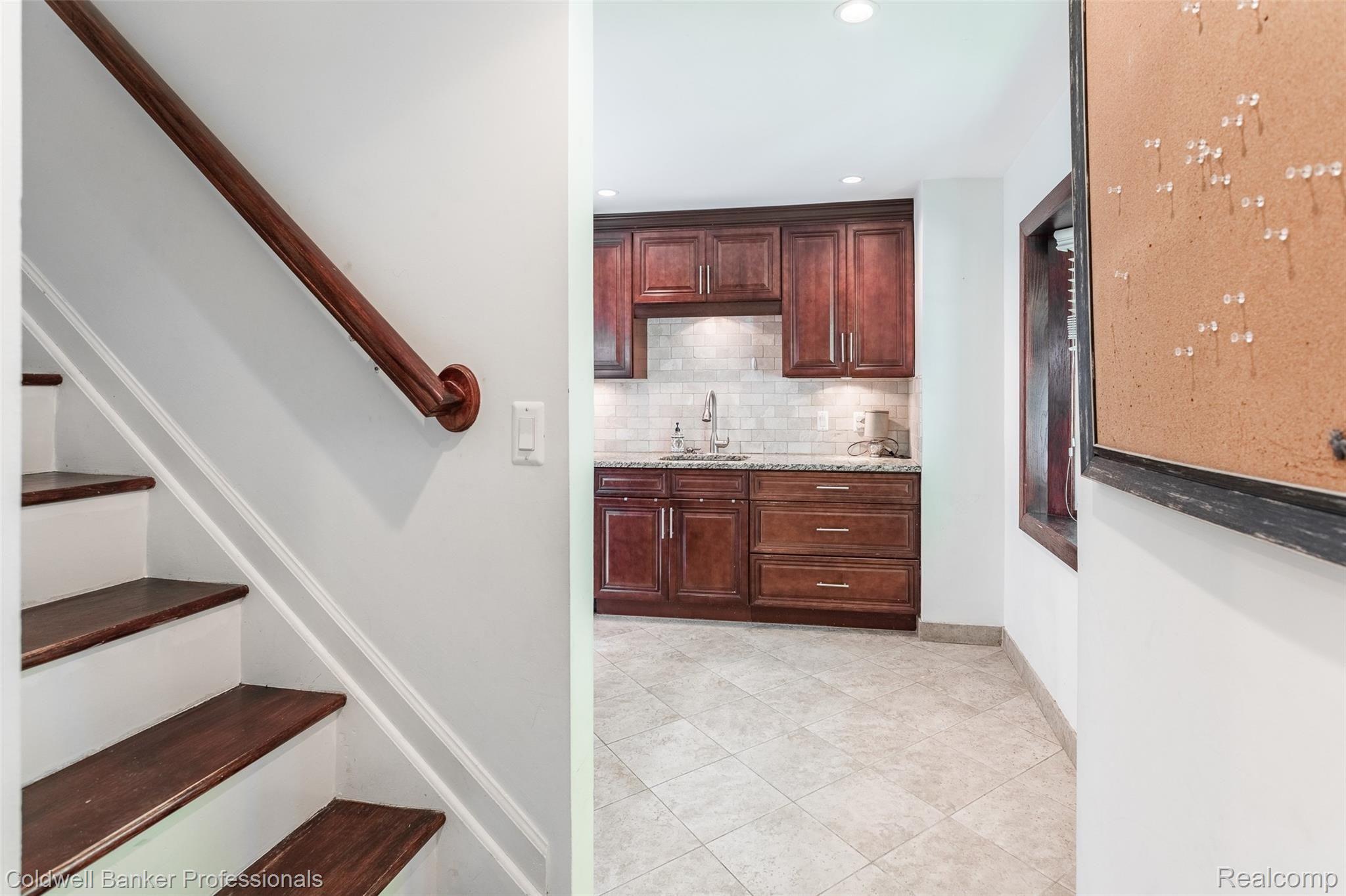 2236 Pembroke Road Birmingham, MI 48009 - Photo 12 of 37 Staircase and entry into kichen