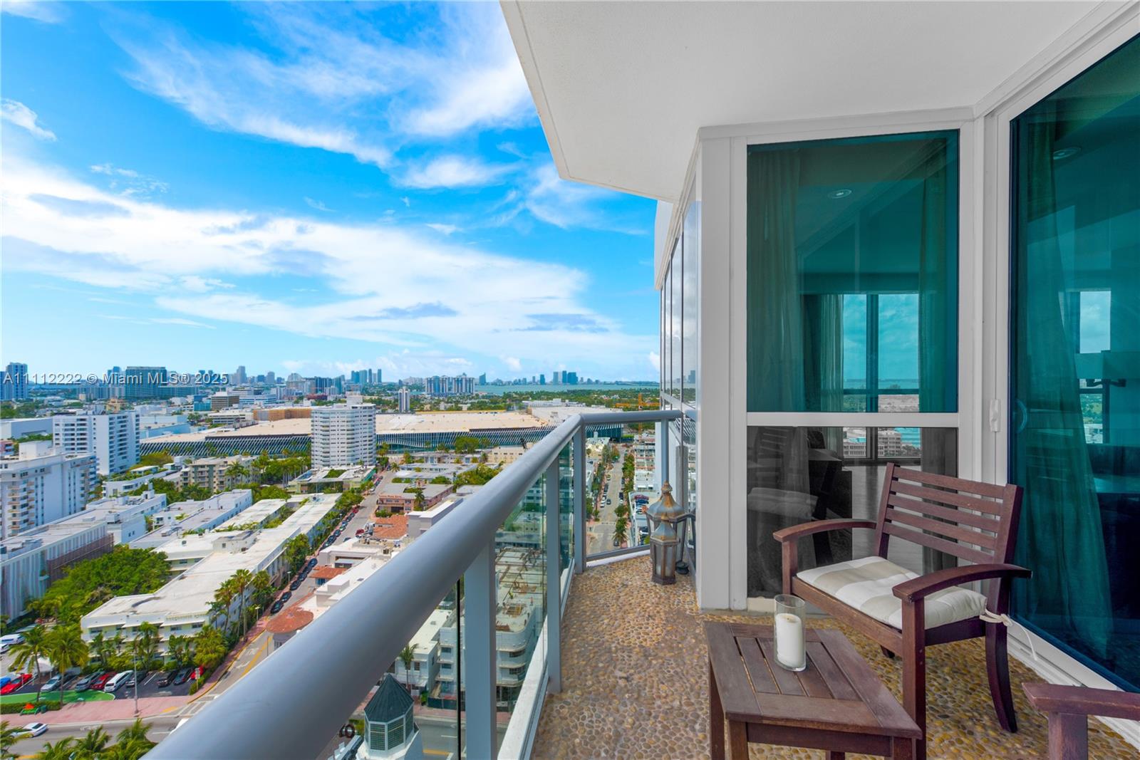 101 20th Street, Unit 2402 Miami Beach, FL 33139 - Photo 21 of 23 a view of a balcony with furniture