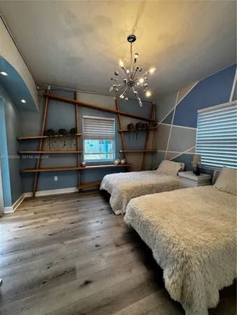a utility room with a refrigerator and washing machine