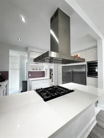 a bathroom with a toilet a sink and a shower