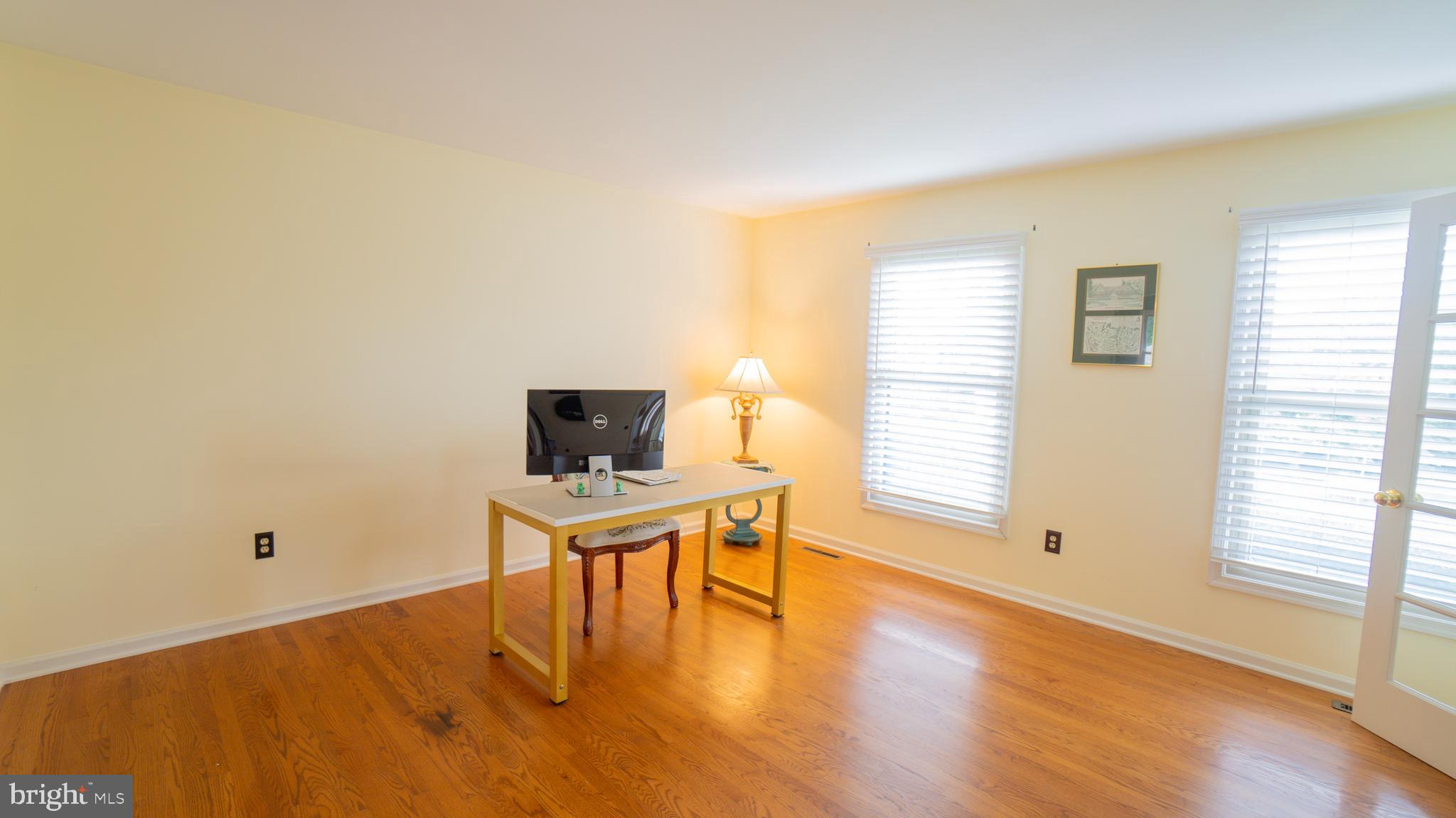 1042 Country Club Road Camp Hill, PA 17011 - Photo 18 of 41 a view of a livingroom with a table and a window