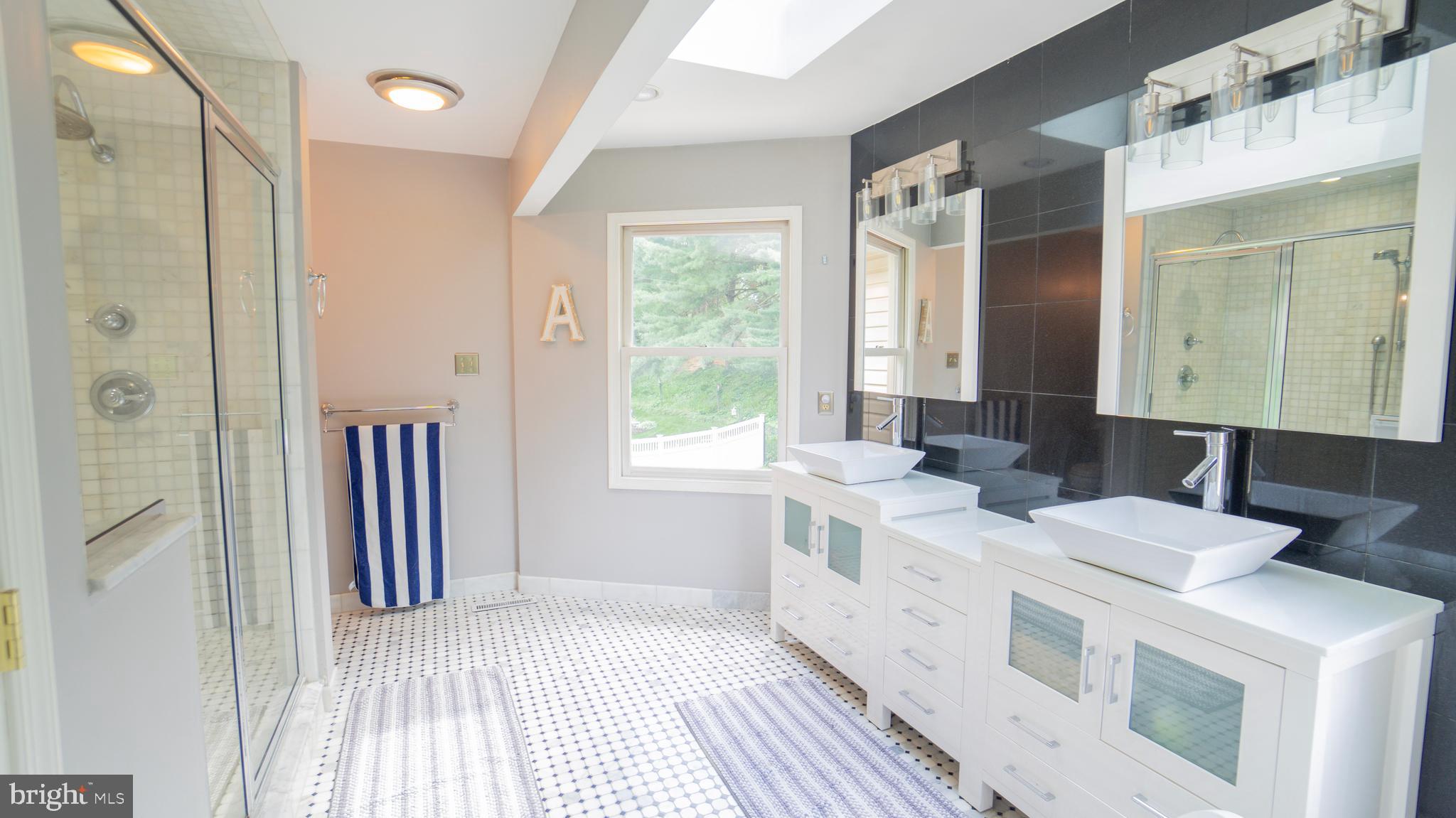 1042 Country Club Road Camp Hill, PA 17011 - Photo 24 of 41 a bathroom with a sink and a mirror