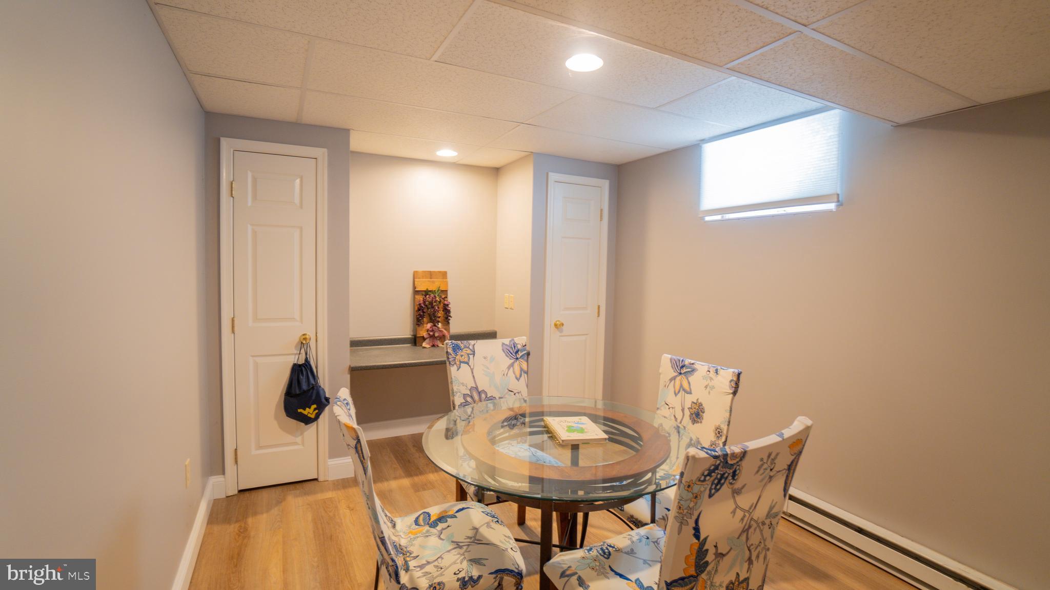 1042 Country Club Road Camp Hill, PA 17011 - Photo 35 of 41 a view of a dining room with furniture and wooden floor