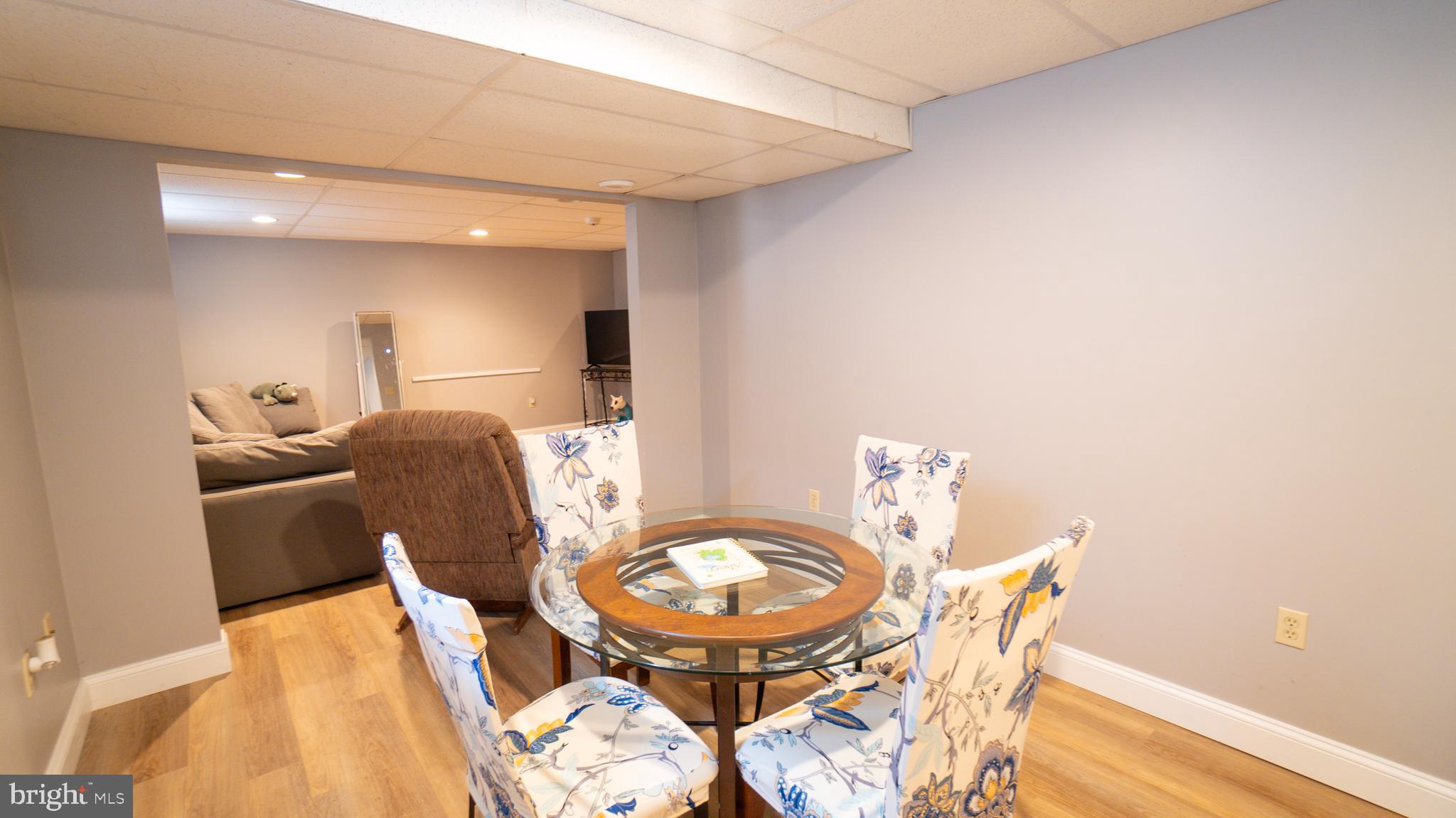 1042 Country Club Road Camp Hill, PA 17011 - Photo 36 of 41 a view of a dining room with furniture and wooden floor