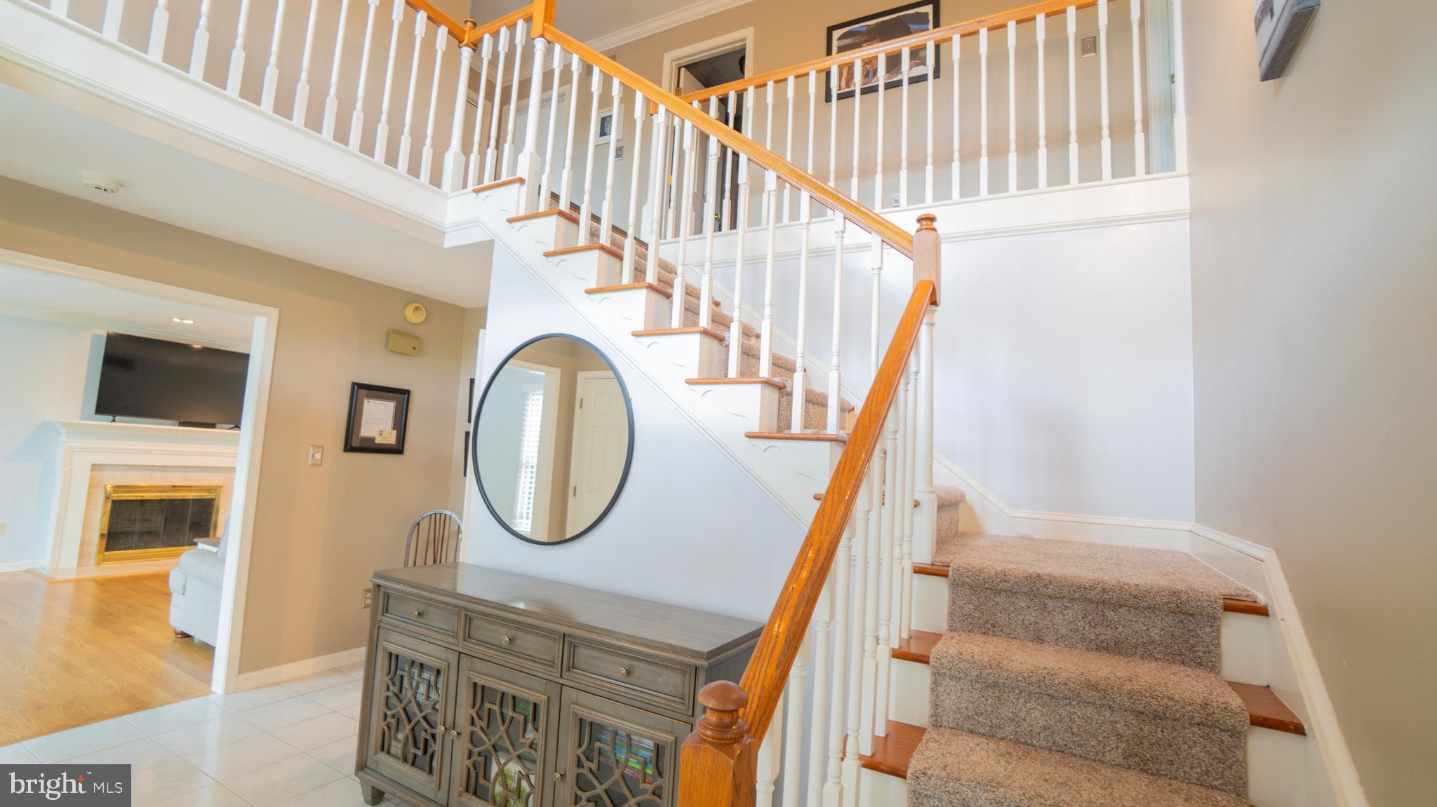 1042 Country Club Road Camp Hill, PA 17011 - Photo 7 of 41 a front view of a house with wooden floor and a front door