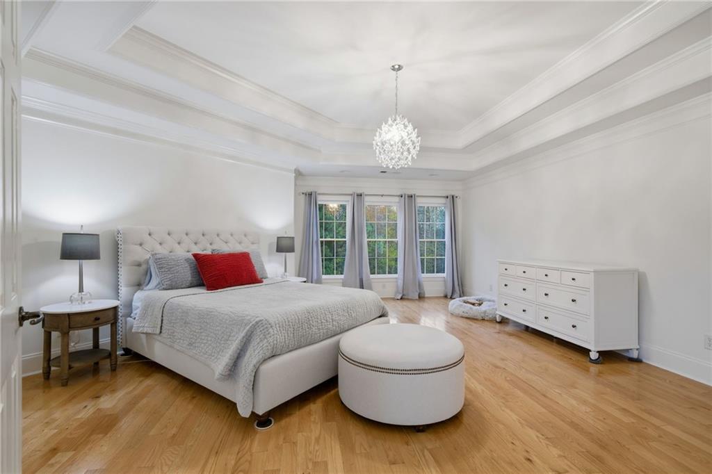 2058 Windermere Crossing Cumming, GA 30041 - Photo 36 of 75 a bedroom with a bed and a window