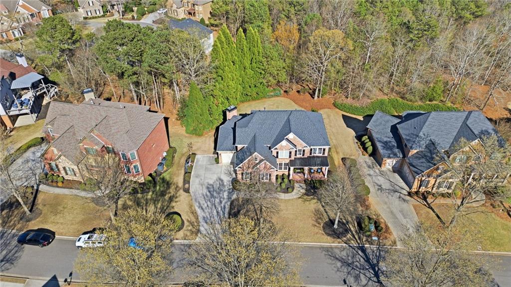 2058 Windermere Crossing Cumming, GA 30041 - Photo 62 of 75 an aerial view of a house with a yard