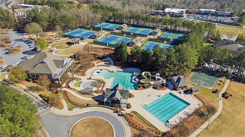 2058 Windermere Crossing Cumming, GA 30041 - Photo 67 of 75 an aerial view of a house with outdoor space swimming pool and lake view