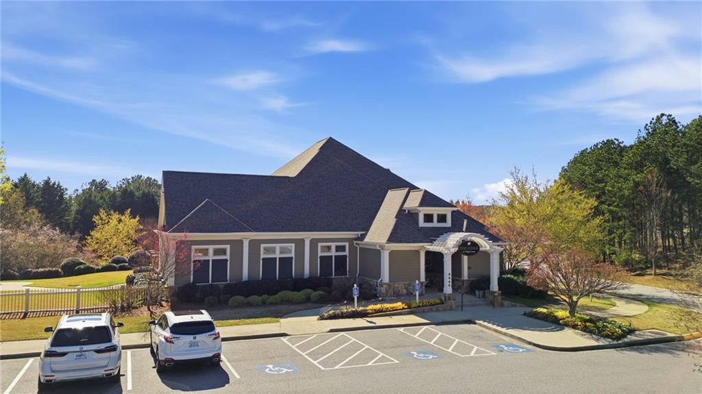 2058 Windermere Crossing Cumming, GA 30041 - Photo 68 of 75 a front view of a house with a yard