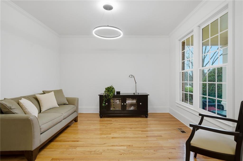 2058 Windermere Crossing Cumming, GA 30041 - Photo 9 of 75 a living room with furniture and a large window