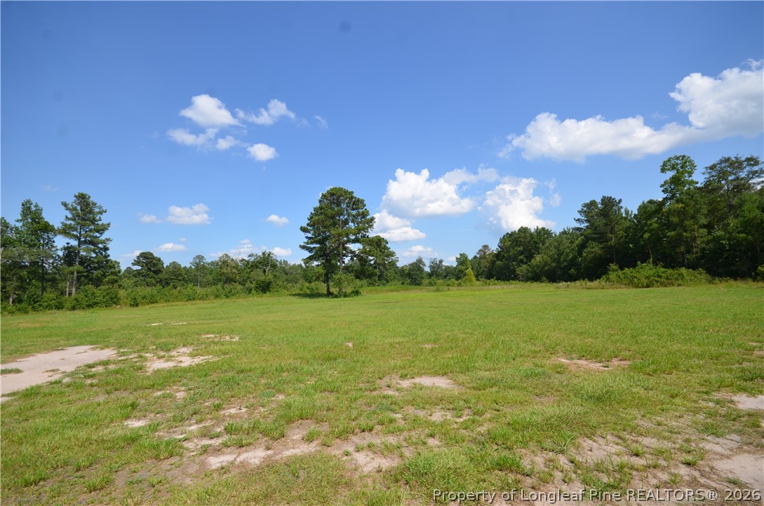 1865 John B Carter Road Fayetteville, NC 28312 - Photo 37 of 49 a view of a lake and a yard