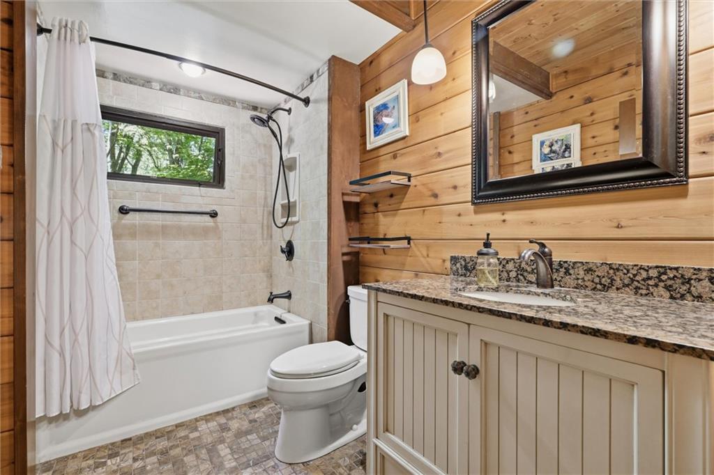 6110 Saltsburg Road Murrysville, PA 15668 - Photo 20 of 47 a bathroom with a granite countertop sink toilet and shower