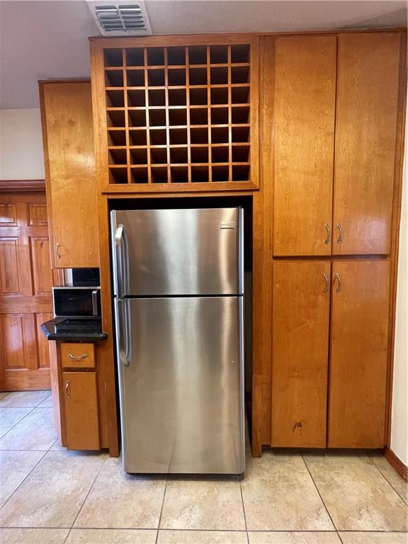 1305 East Olympia Avenue, Unit A McAllen, TX 78503 - Photo 4 of 13 a view of electric appliances and cabinets