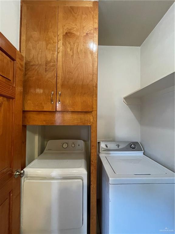 1305 East Olympia Avenue, Unit A McAllen, TX 78503 - Photo 6 of 13 a utility room with dryer and washer
