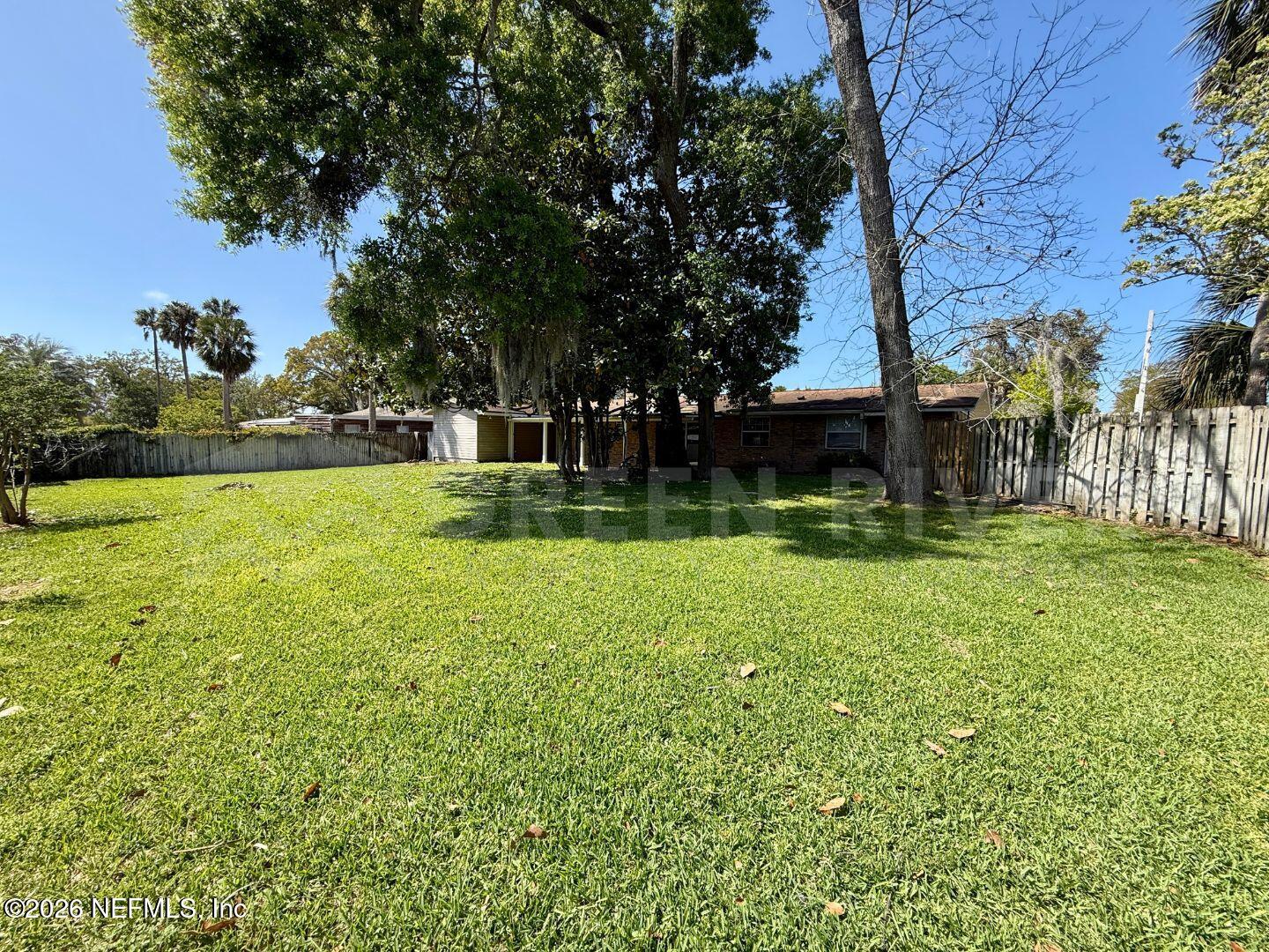 2 Fairway Road Jacksonville Beach, FL 32250 - Photo 36 of 39 a view of a backyard with a garden
