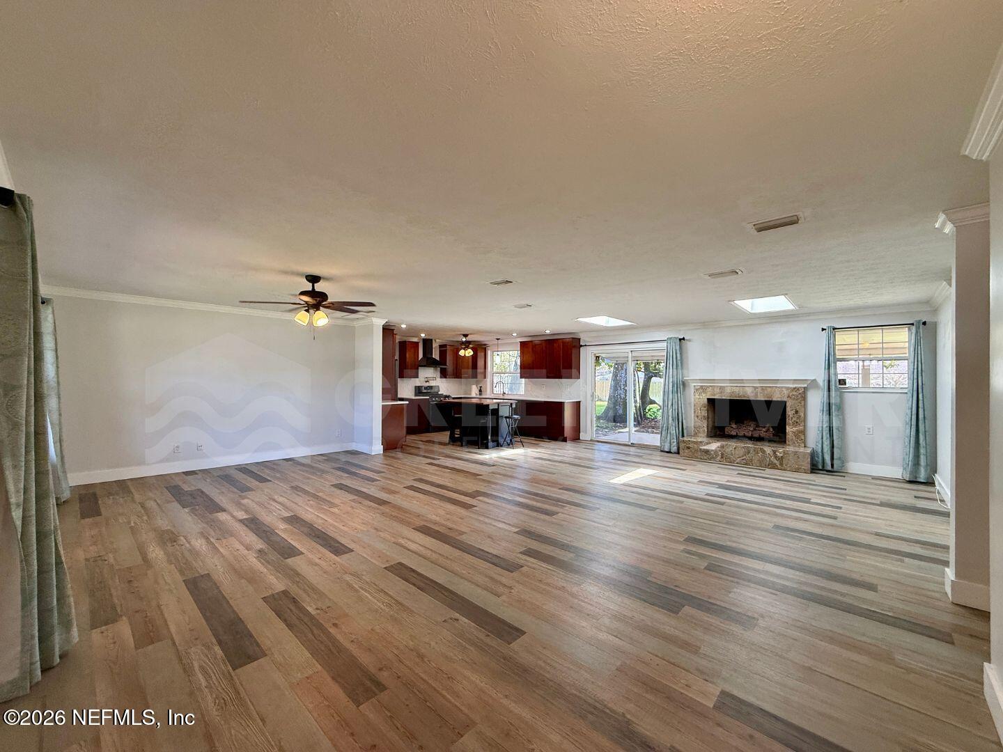 2 Fairway Road Jacksonville Beach, FL 32250 - Photo 8 of 39 a view of empty room with wooden floor