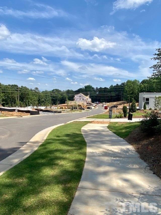 3913 Milltown Ridge Run Raleigh, NC 27612 - Photo 11 of 11 a view of swimming pool and lake view