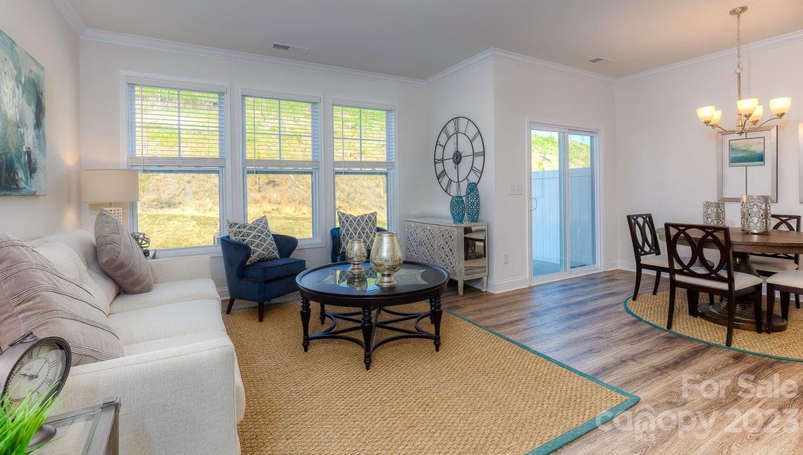 43 Ravens Rdg Road Hendersonville, NC 28792 - Photo 10 of 27 a living room with furniture and a large window