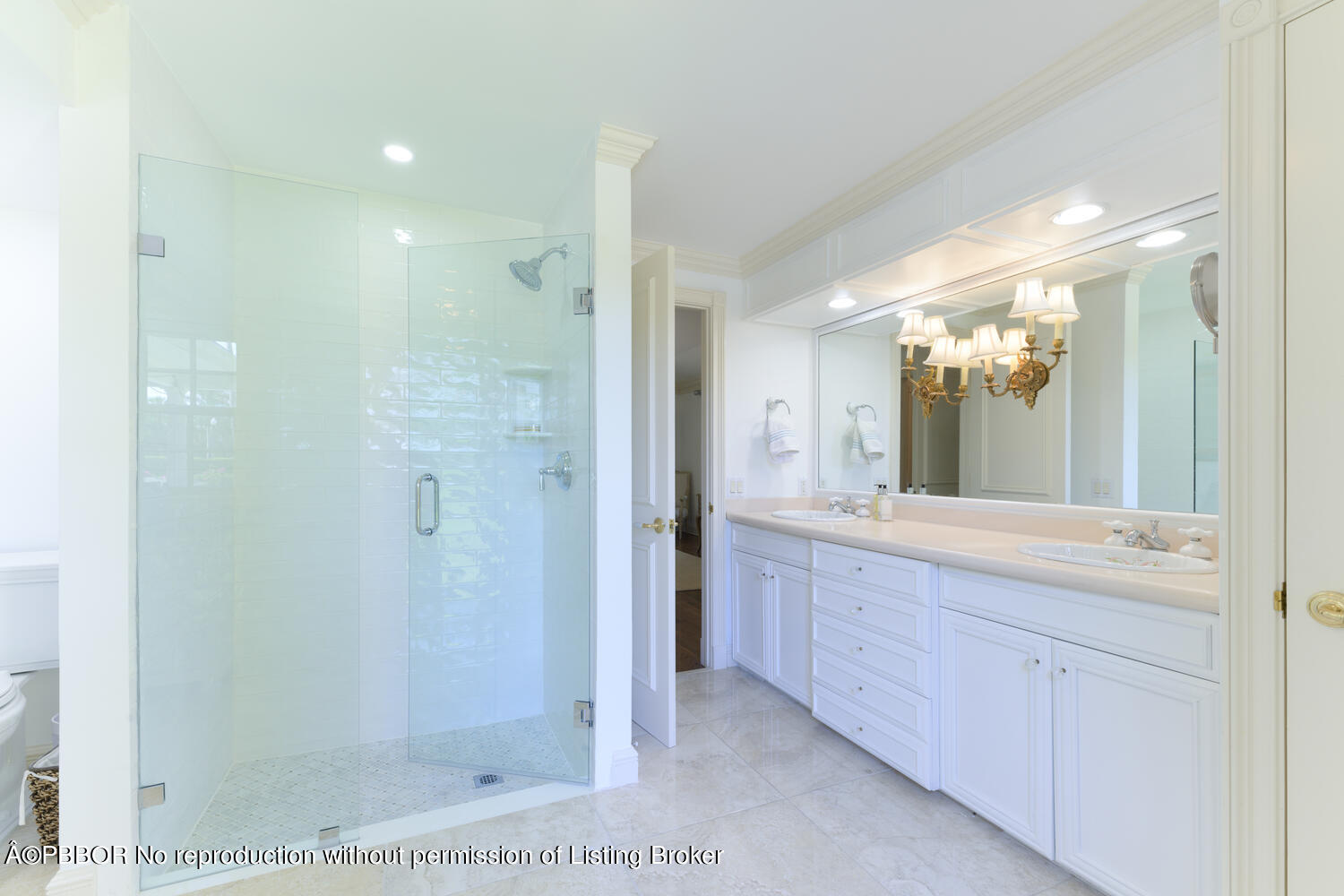 201 Pendleton Avenue Palm Beach, FL 33480 - Photo 10 of 22 a bathroom with a granite countertop sink a mirror and a shower