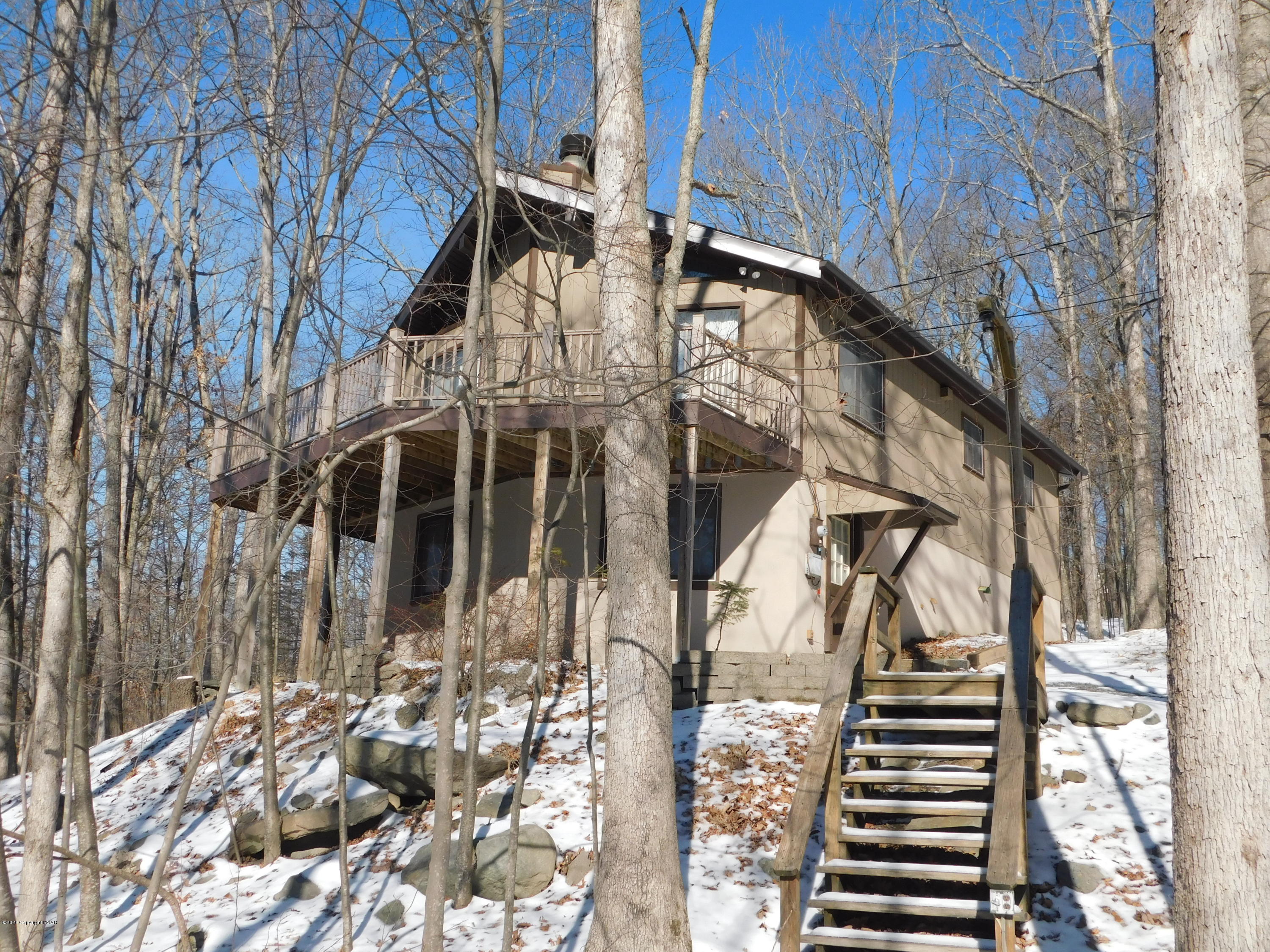 200 Canterbury Road Bushkill, PA 18324 - Photo 1 of 48 a view of a house with a street