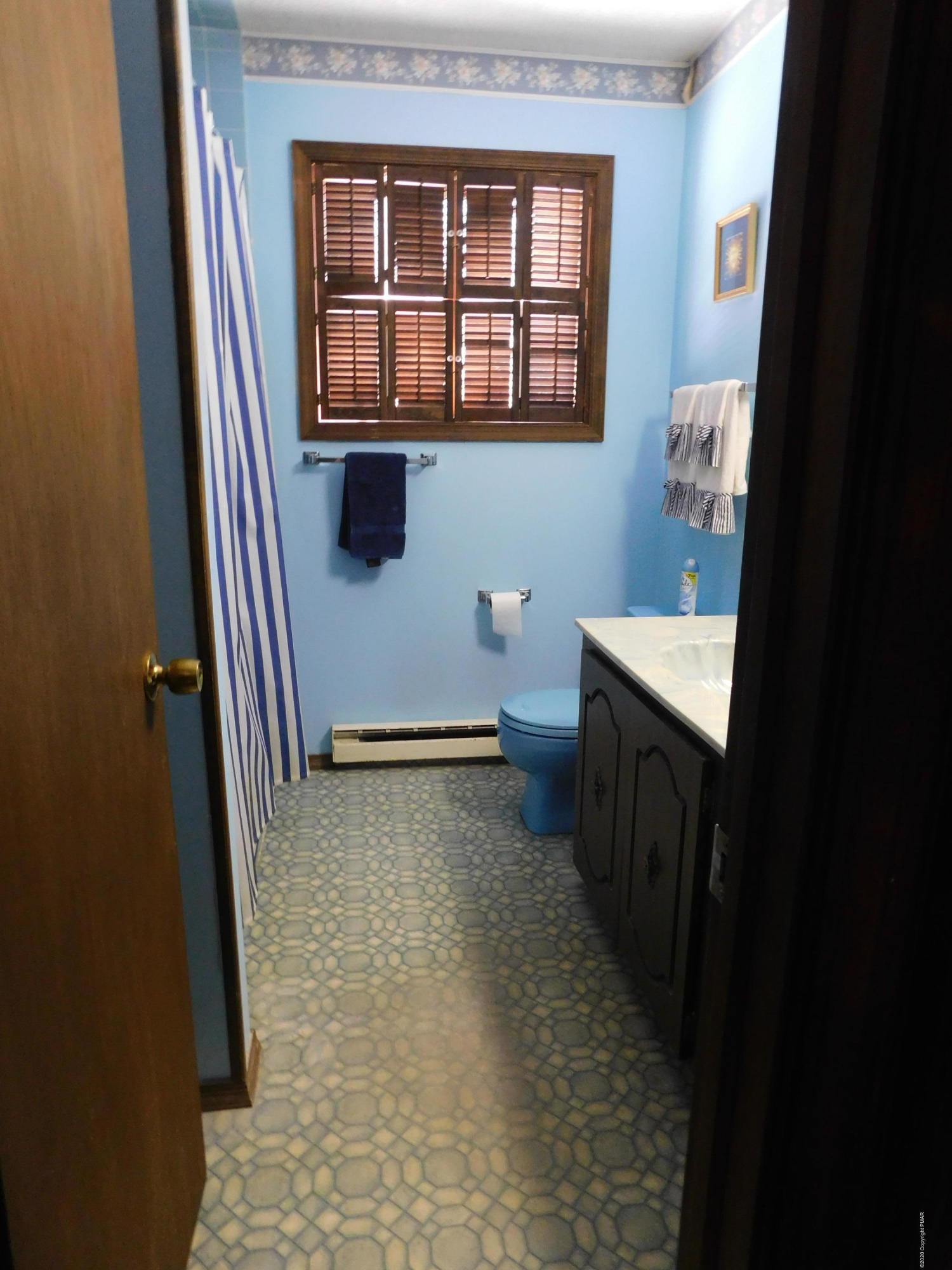 200 Canterbury Road Bushkill, PA 18324 - Photo 13 of 48 a bathroom with a toilet