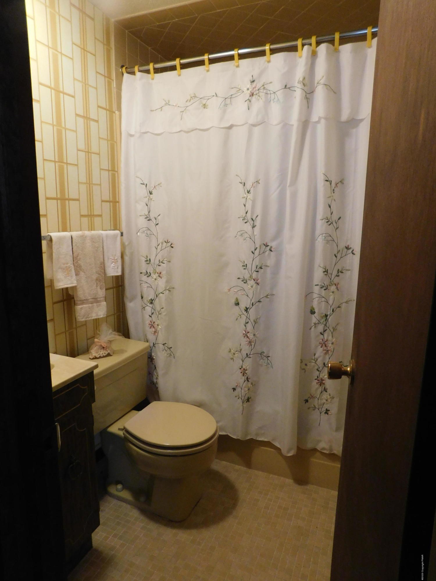 200 Canterbury Road Bushkill, PA 18324 - Photo 14 of 48 a white toilet sitting next to a shower curtain