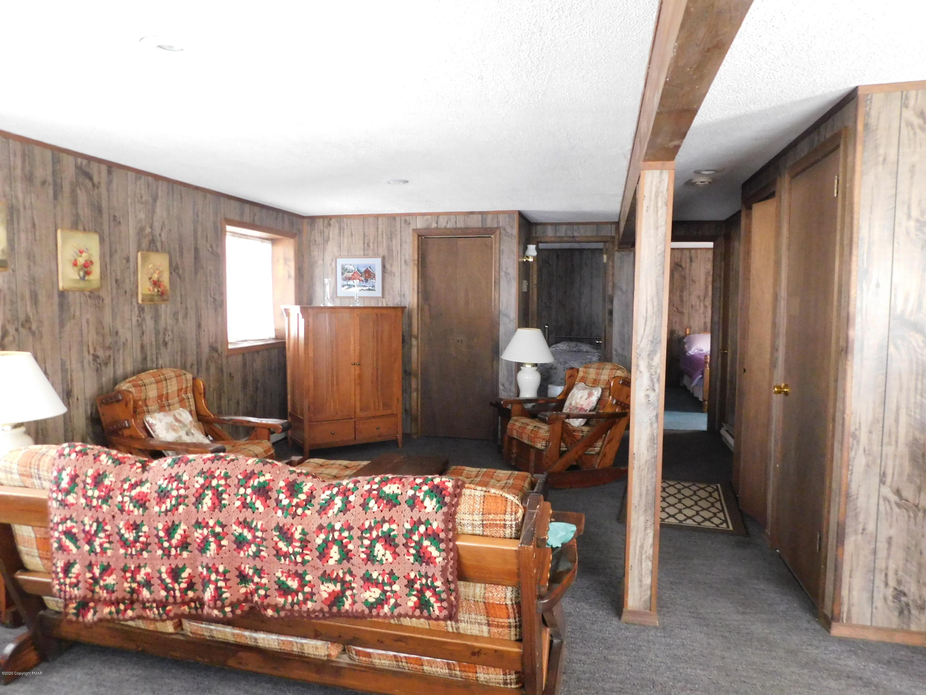 200 Canterbury Road Bushkill, PA 18324 - Photo 15 of 48 a bedroom with bed and a window