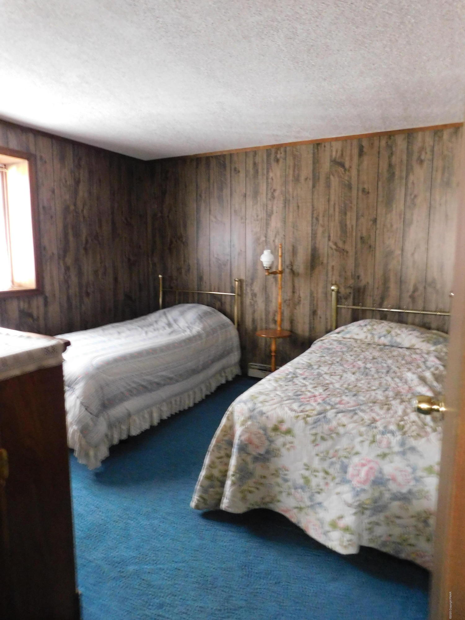 200 Canterbury Road Bushkill, PA 18324 - Photo 18 of 48 a bedroom with two beds and painted walls