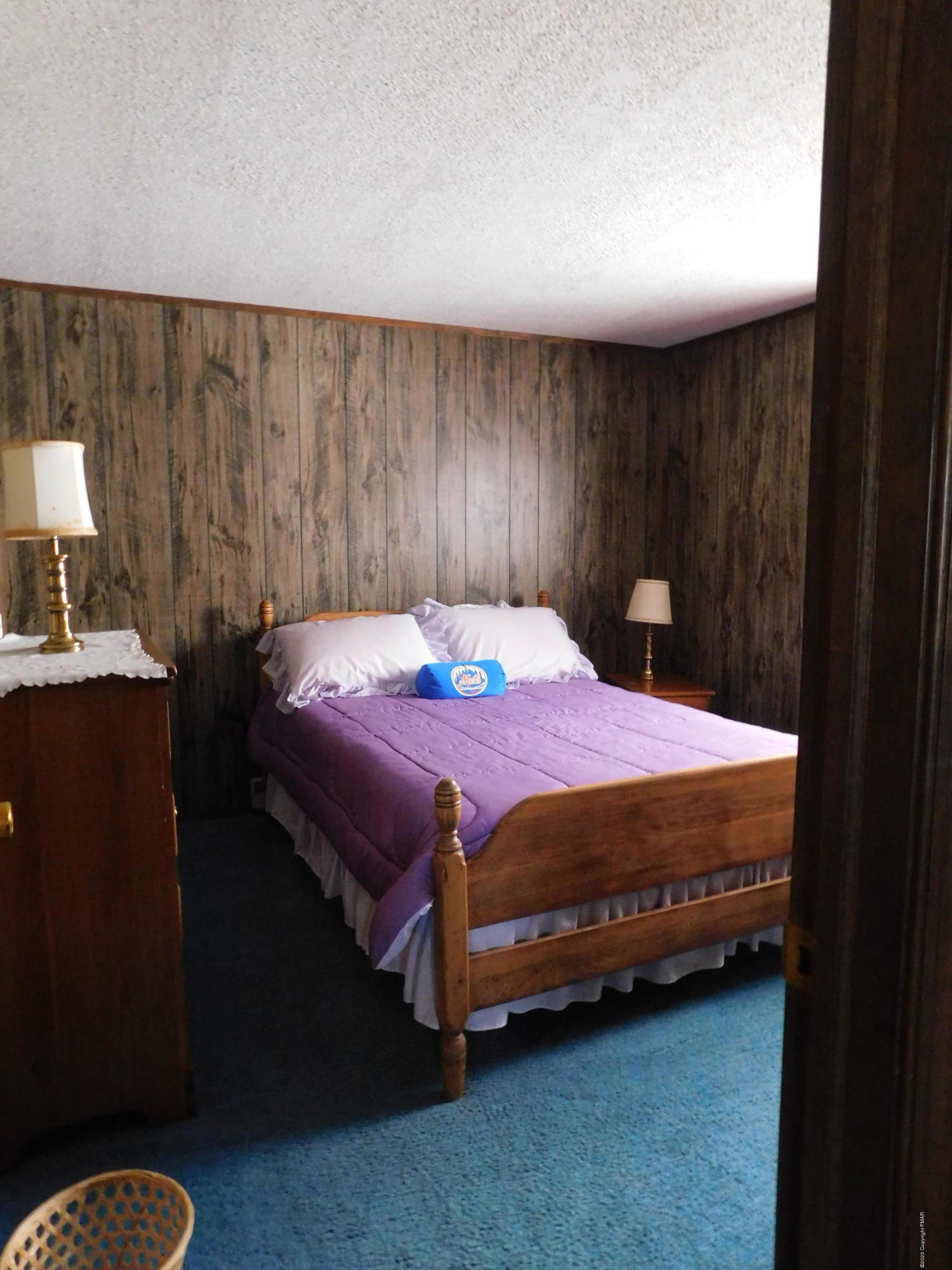 200 Canterbury Road Bushkill, PA 18324 - Photo 19 of 48 a bedroom with a bed and a night stand