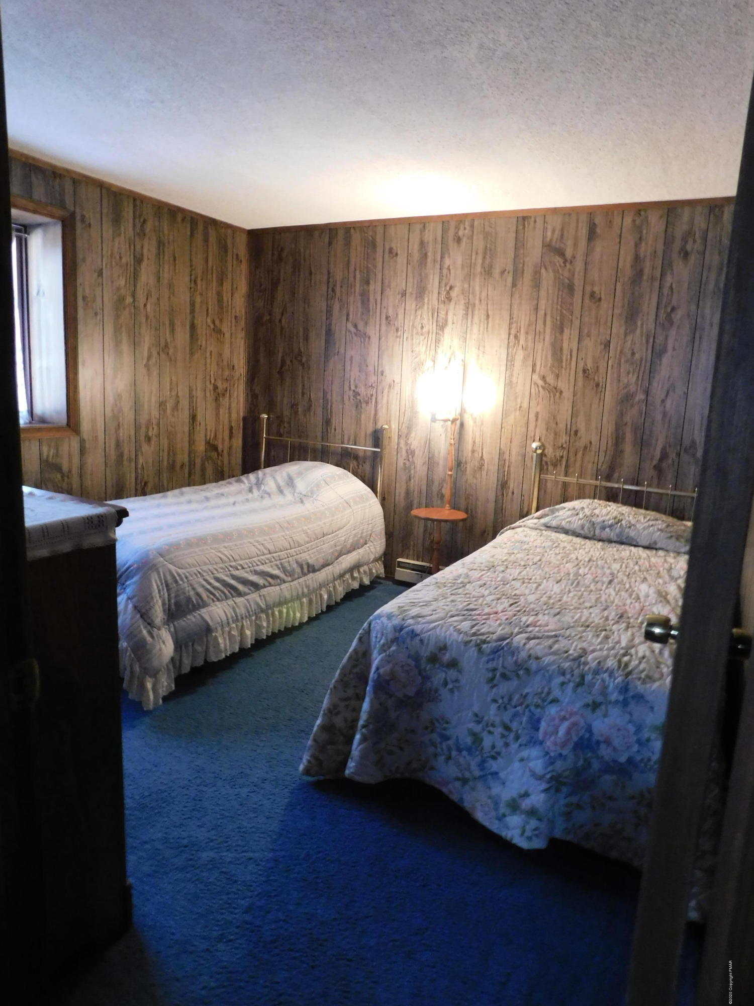 200 Canterbury Road Bushkill, PA 18324 - Photo 21 of 48 a bedroom with double bed and a window