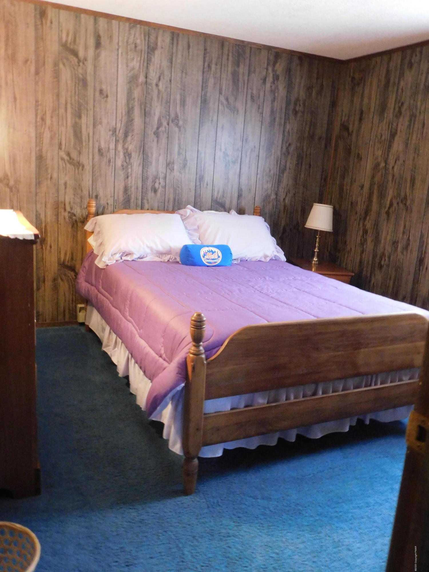 200 Canterbury Road Bushkill, PA 18324 - Photo 22 of 48 a bedroom with a bed and a cabinets