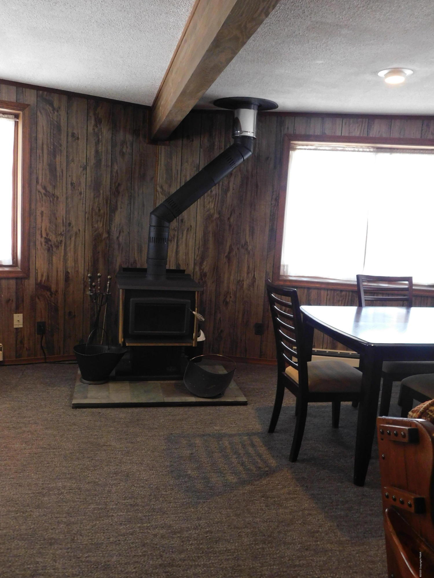 200 Canterbury Road Bushkill, PA 18324 - Photo 25 of 48 a living room with furniture a window and a fireplace