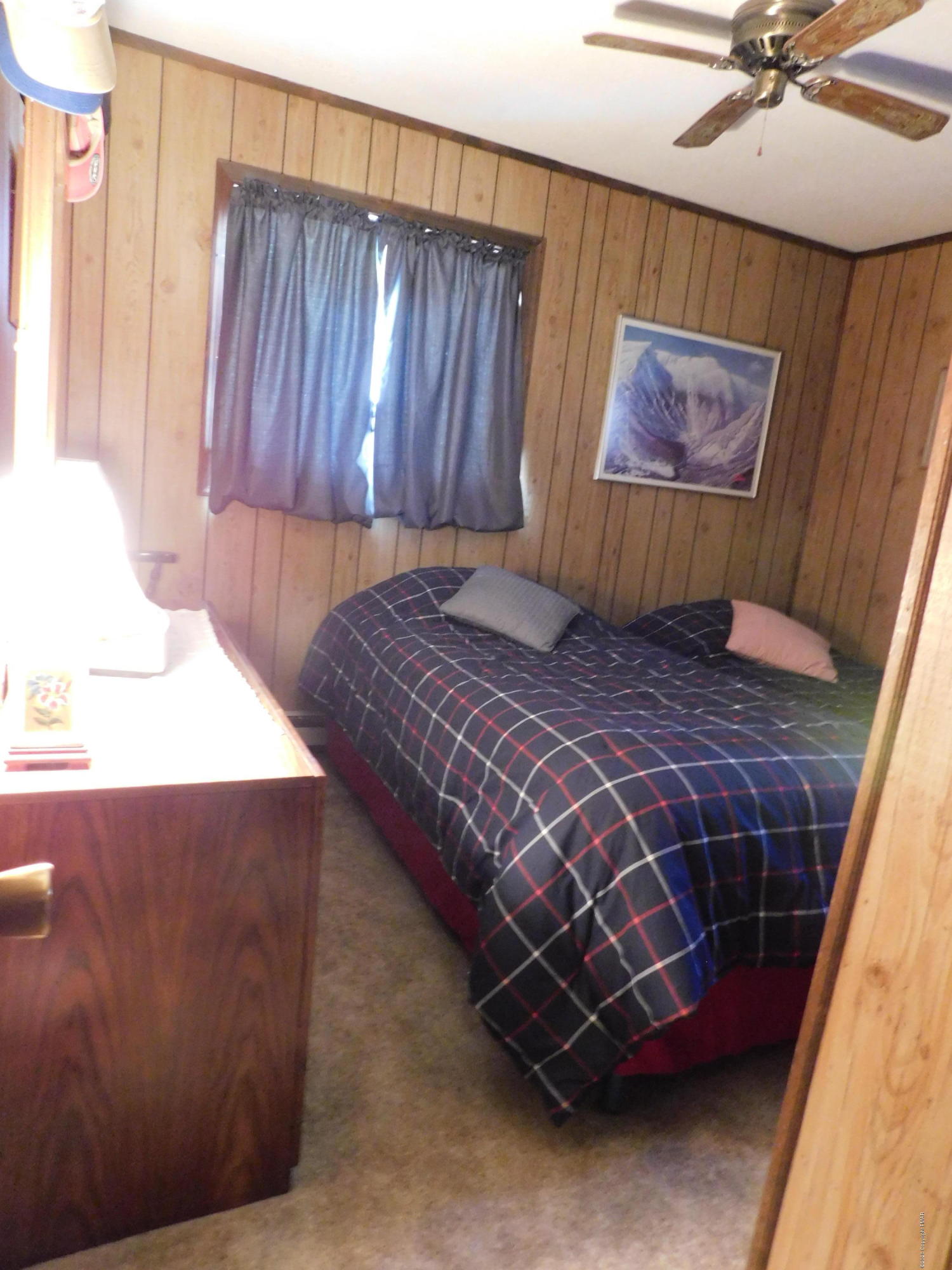 200 Canterbury Road Bushkill, PA 18324 - Photo 28 of 48 a bedroom with a bed and painting on the wall