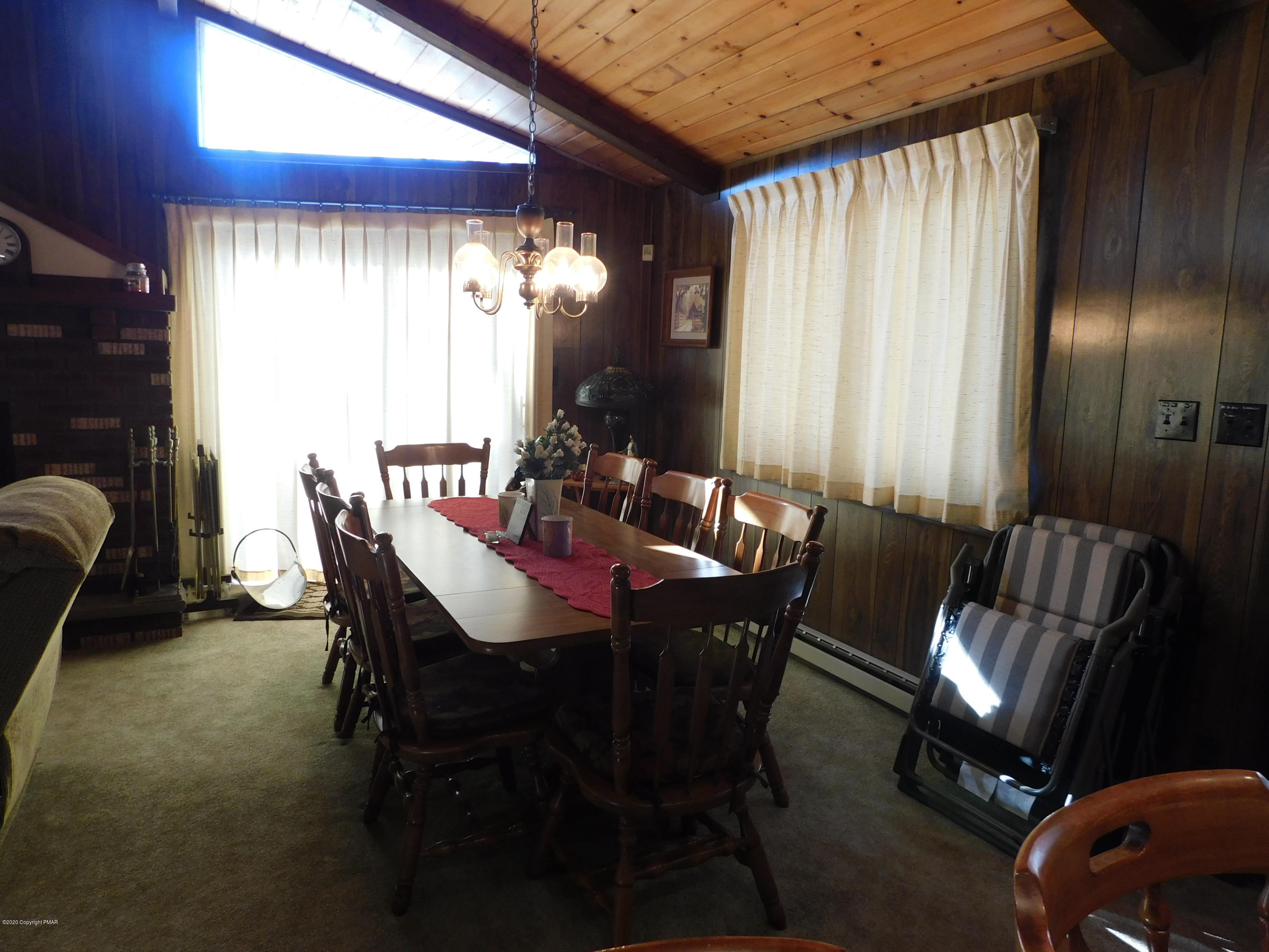200 Canterbury Road Bushkill, PA 18324 - Photo 3 of 48 a view of a dining room with furniture and window