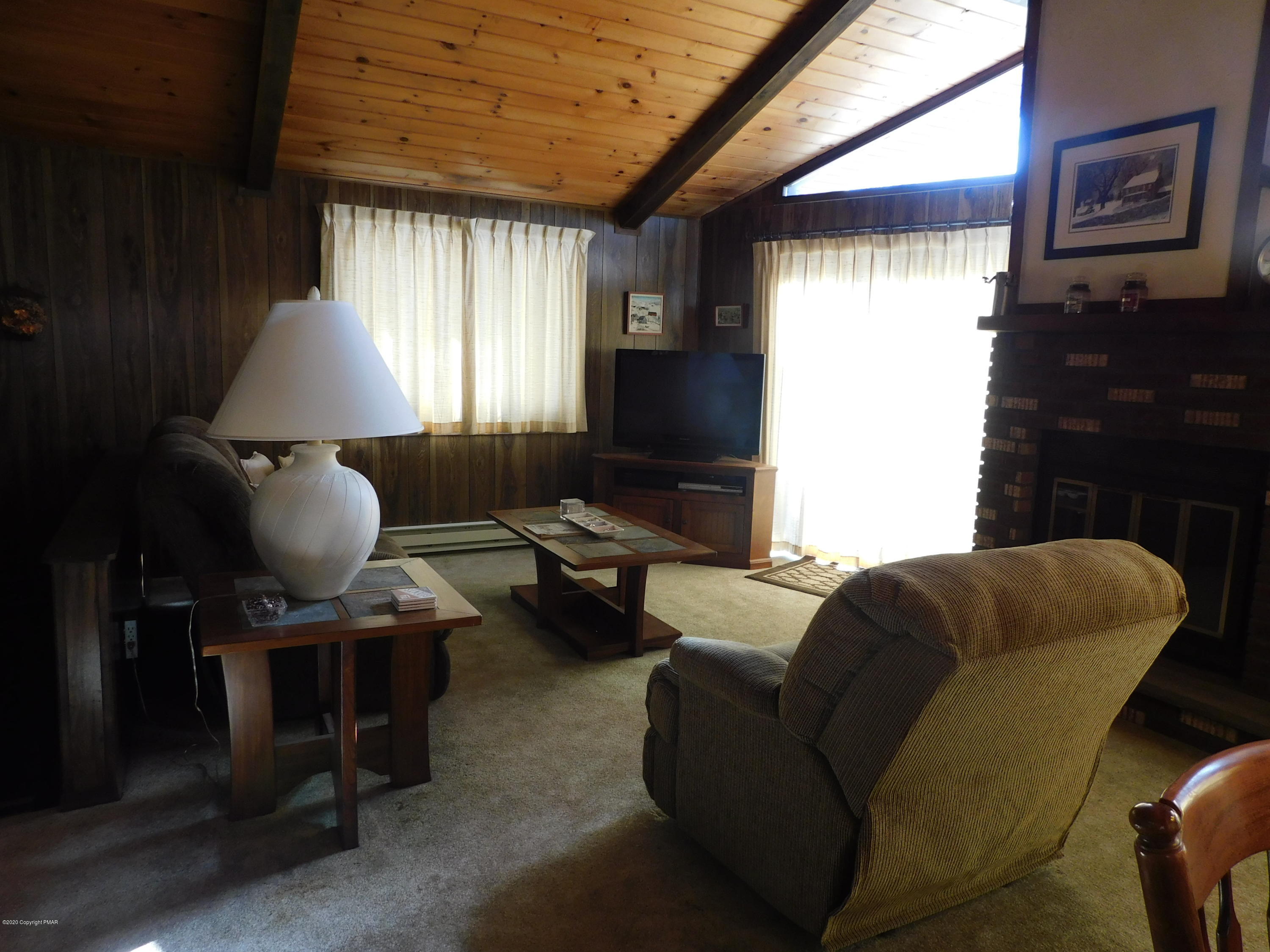 200 Canterbury Road Bushkill, PA 18324 - Photo 33 of 48 a living room with furniture and a window