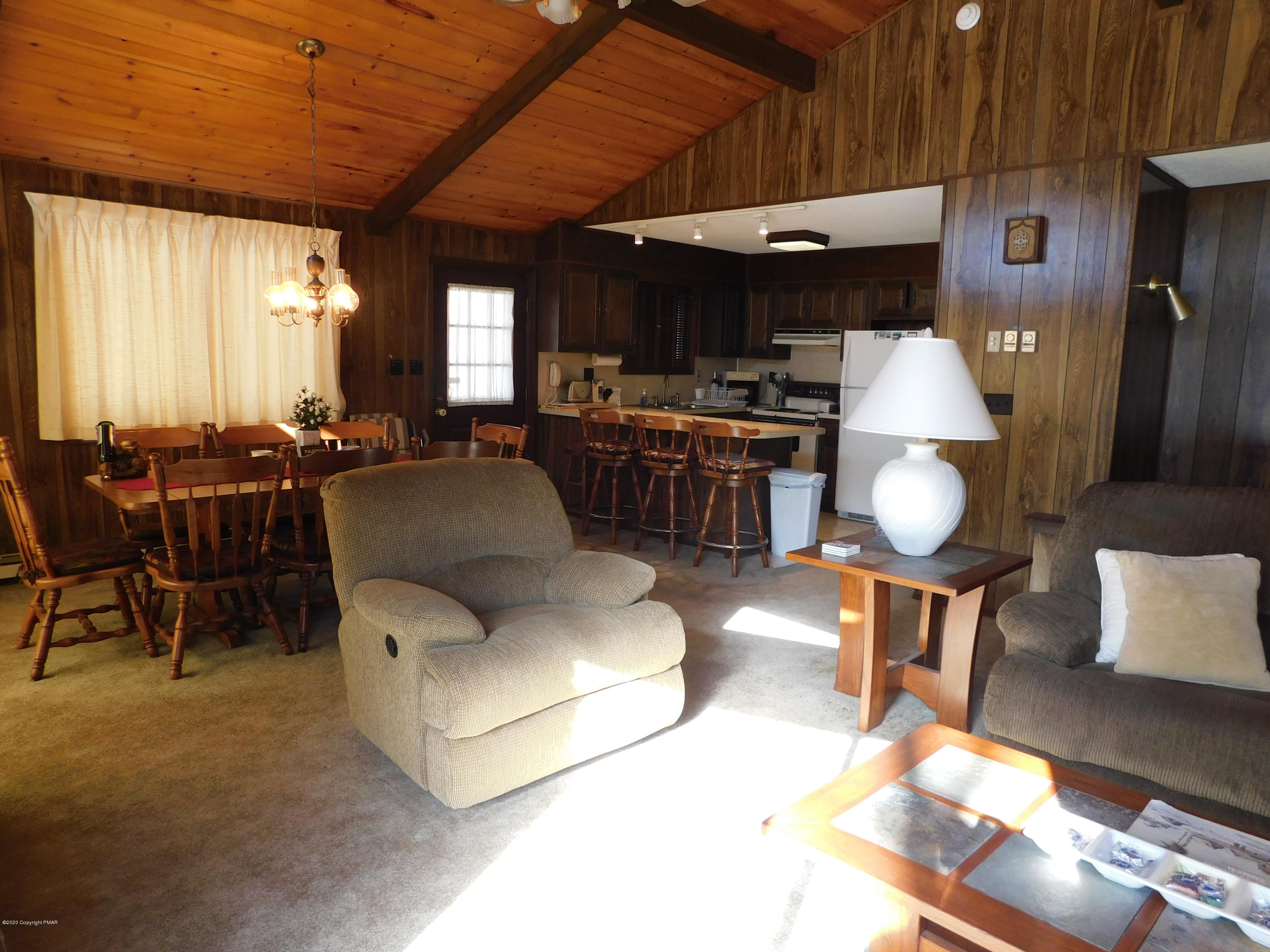 200 Canterbury Road Bushkill, PA 18324 - Photo 34 of 48 a living room with furniture and a large window