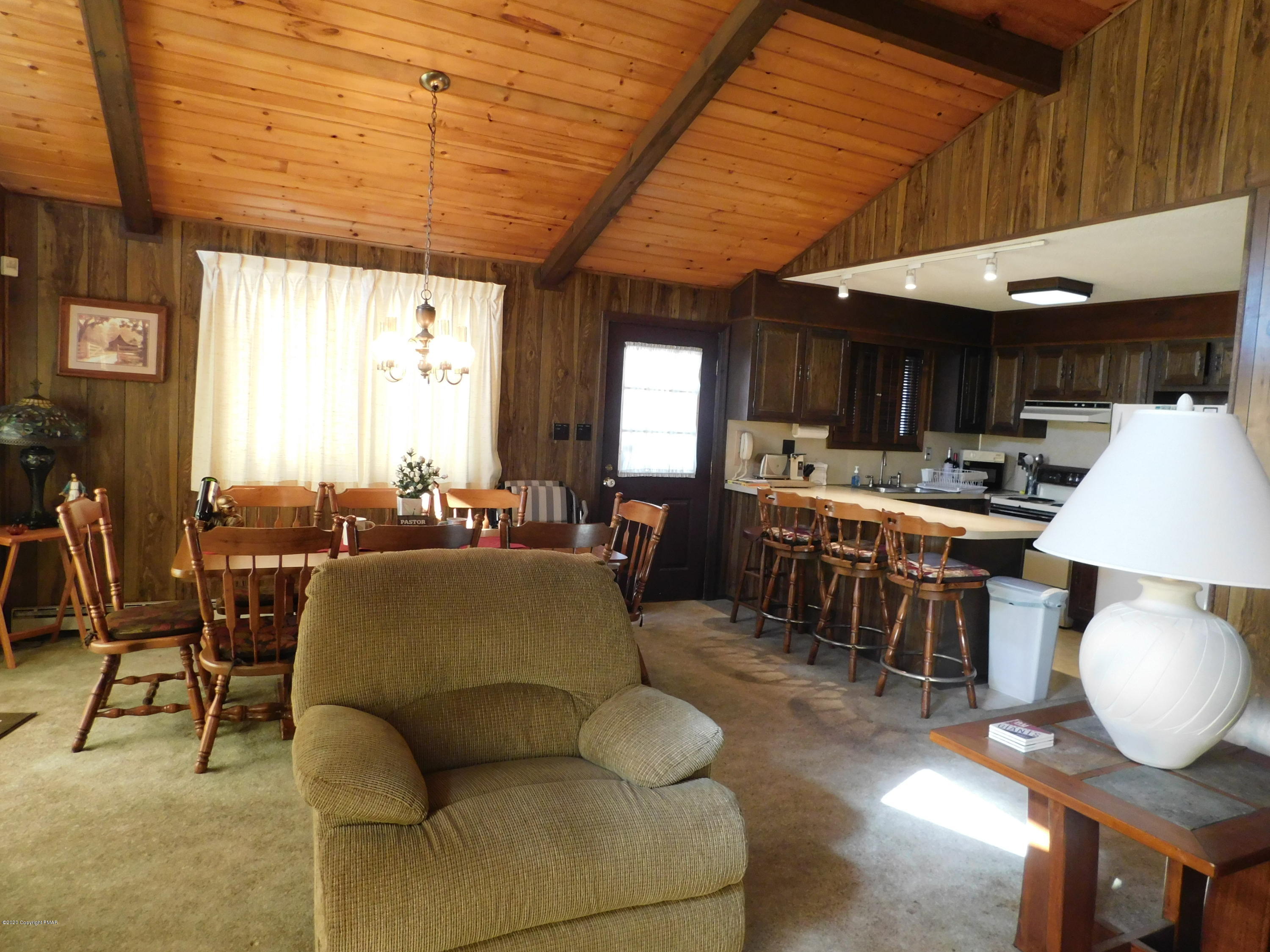 200 Canterbury Road Bushkill, PA 18324 - Photo 48 of 48 a living room filled with furniture and a large window