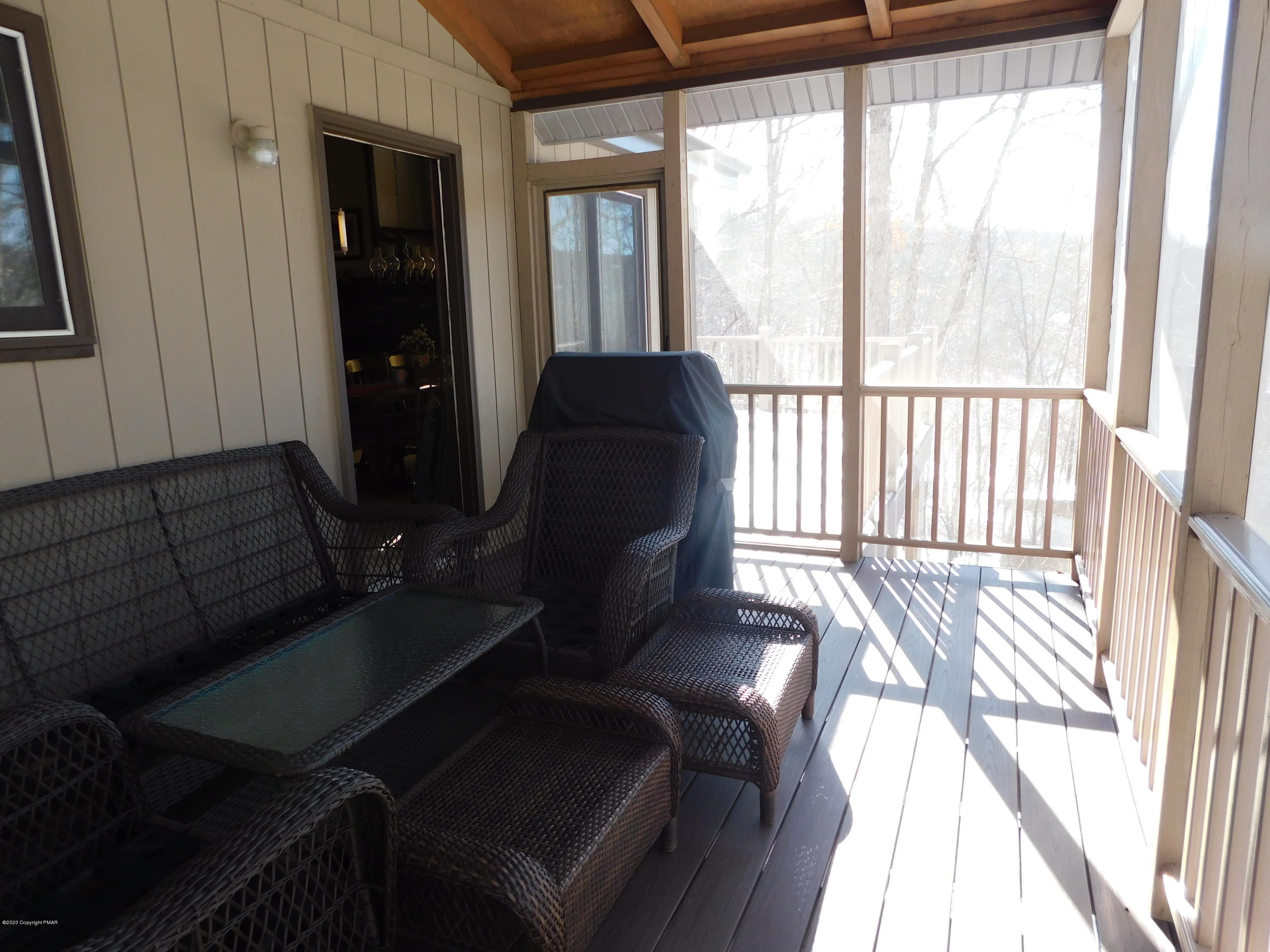 200 Canterbury Road Bushkill, PA 18324 - Photo 38 of 48 a living room with furniture and a window