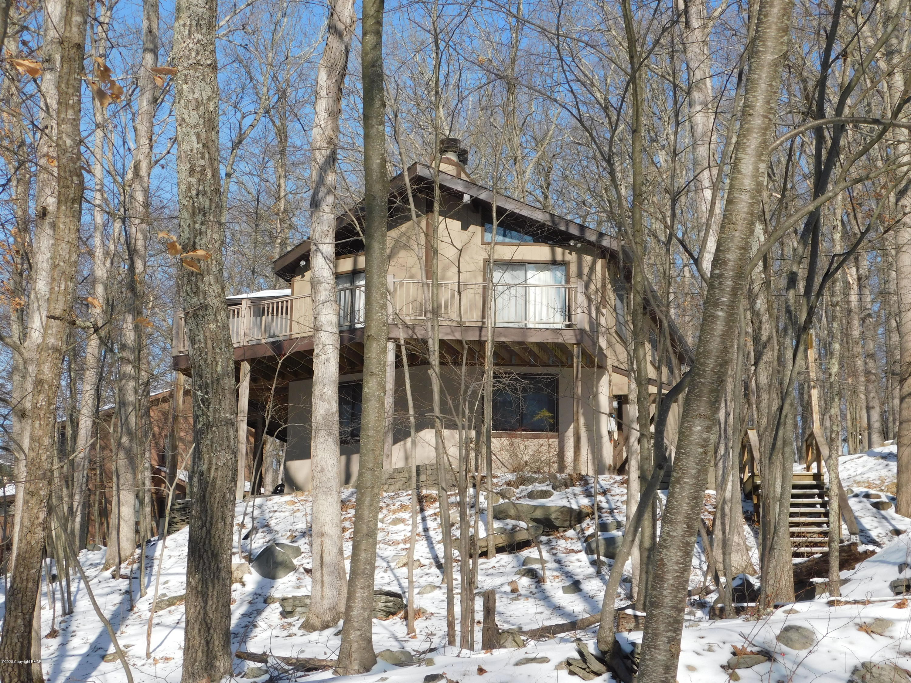 200 Canterbury Road Bushkill, PA 18324 - Photo 43 of 48 a view of a house with a yard