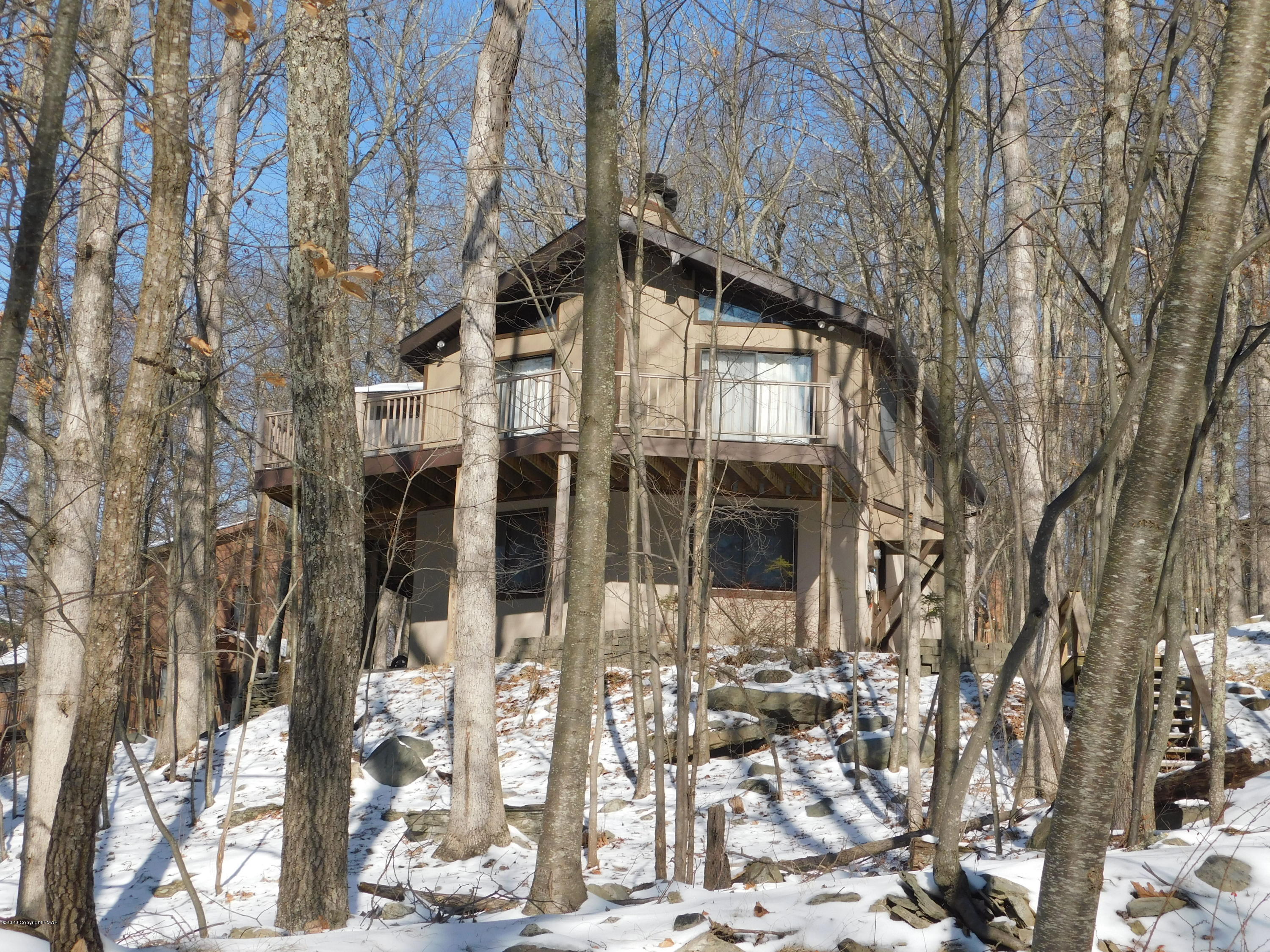 200 Canterbury Road Bushkill, PA 18324 - Photo 45 of 48 a large building with a large tree