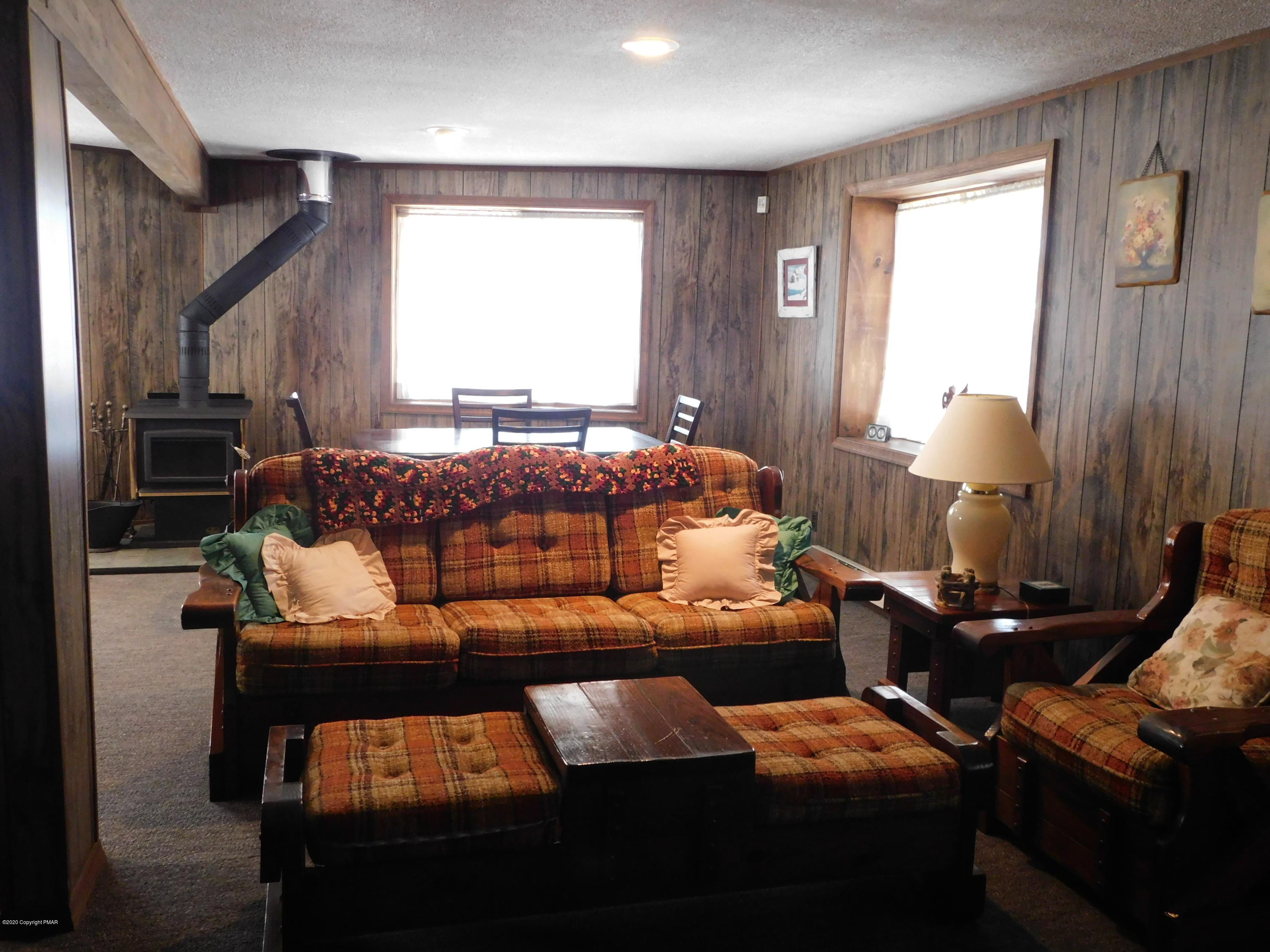 200 Canterbury Road Bushkill, PA 18324 - Photo 5 of 48 a bed room with a bed and a window