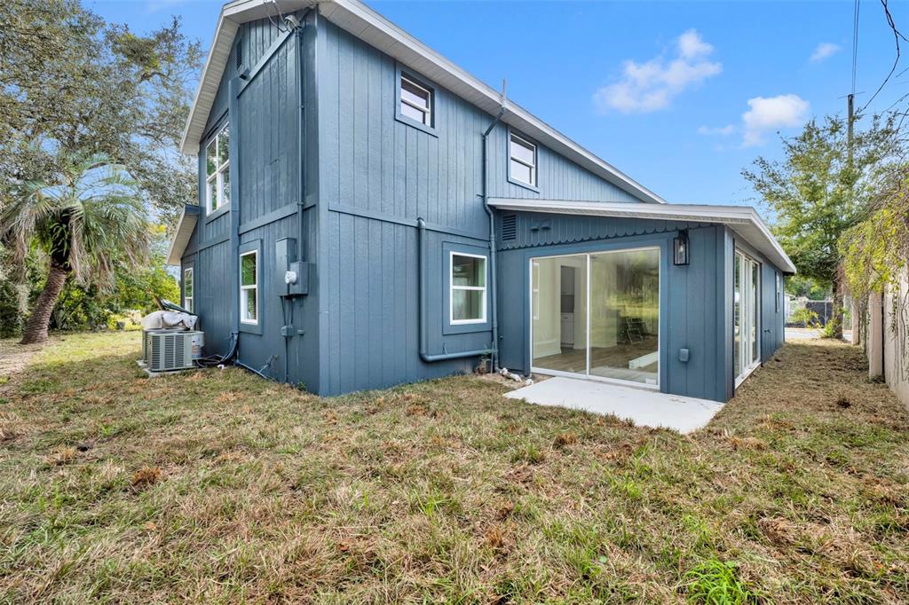 31201 Merry Road Tavares, FL 32778 - Photo 39 of 40 a view of a house with a yard
