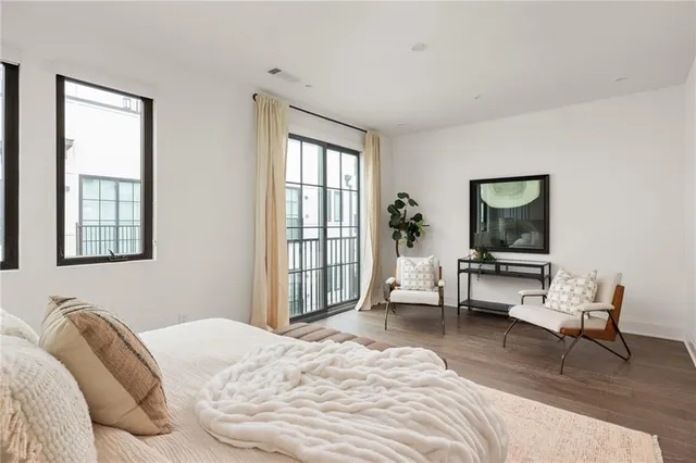 a bathroom with a double vanity sink mirror and shower