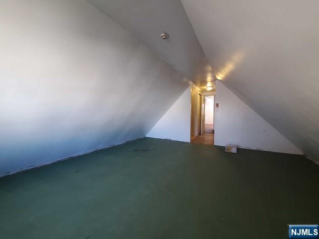 145 Baldwin Street, Unit 2 Bloomfield, NJ 07003 - Photo 15 of 16 a view of an empty room with stairs