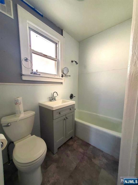 145 Baldwin Street, Unit 2 Bloomfield, NJ 07003 - Photo 10 of 16 a bathroom with a sink toilet and a bathtub