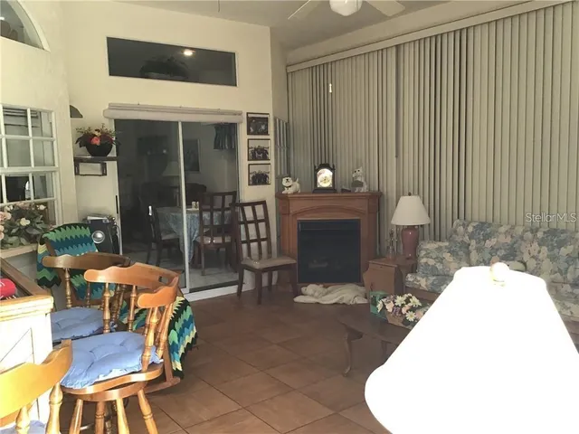 a room with table and chairs