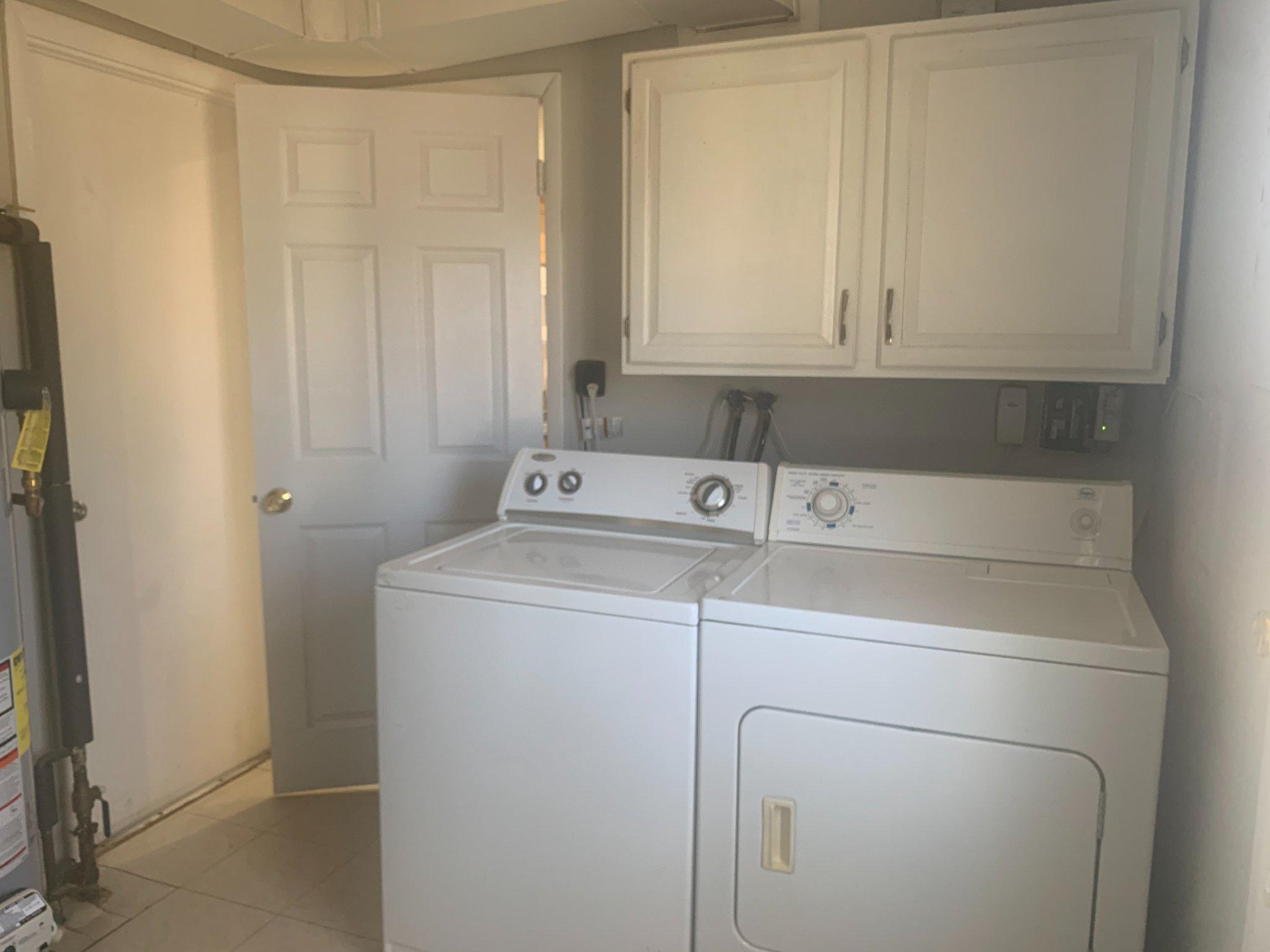 13217 Poplar Tree Road Fairfax, VA 22033 - Photo 8 of 15 Large laundry room with full size washer and dryer