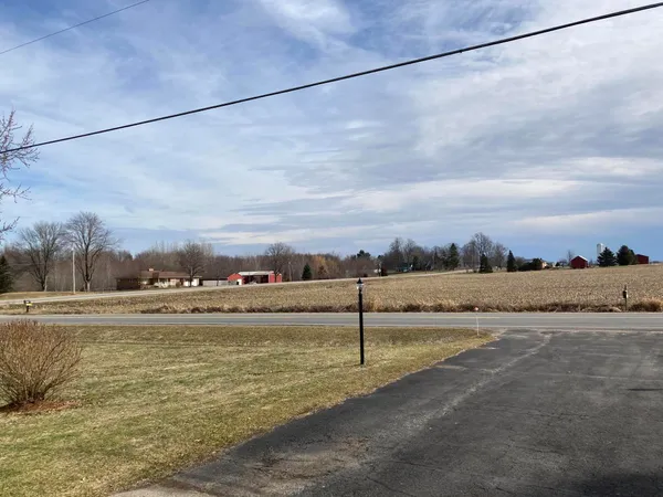$425,000 | 8453 Hanna Lake Avenue Southeast, Caledonia, MI 49316