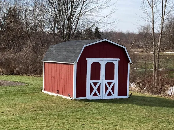 $425,000 | 8453 Hanna Lake Avenue Southeast, Caledonia, MI 49316